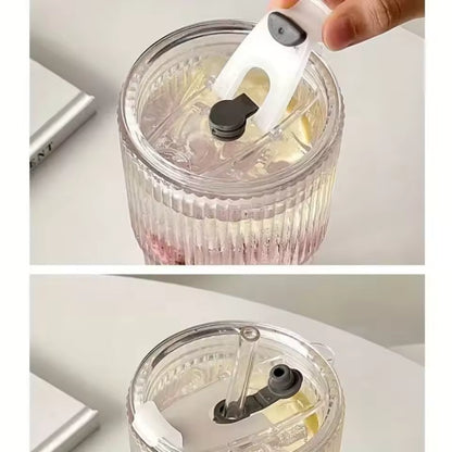 striped glass cup with lid and straw for iced coffee