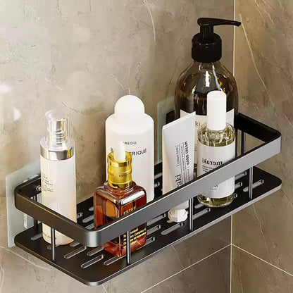 Keep your space tidy with a punch-free adhesive wall shelf. Great for bathroom, kitchen, shampoo storage, and cosmetics.”